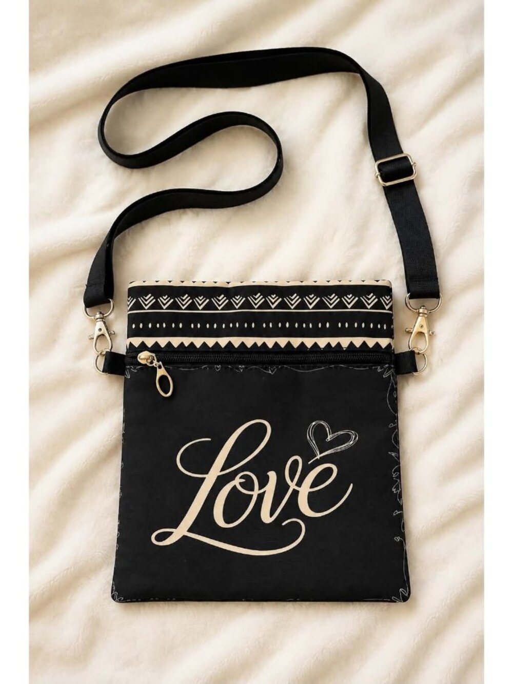Crossbody phone bag featuring the word Love